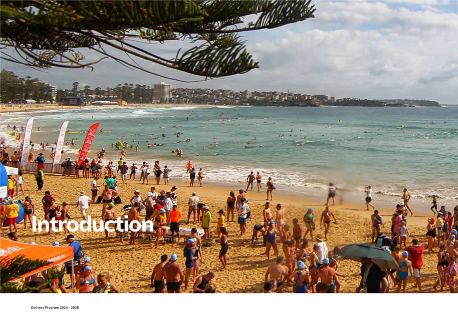 A group of people on a beach

Description automatically generated