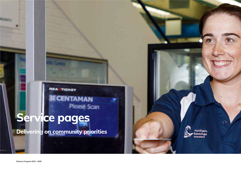 A person pointing at a machine

Description automatically generated