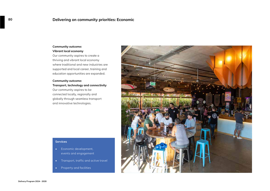 A group of people sitting at a table

Description automatically generated