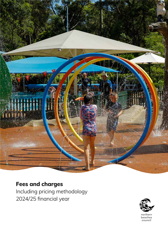 A group of people playing with water in a park

Description automatically generated