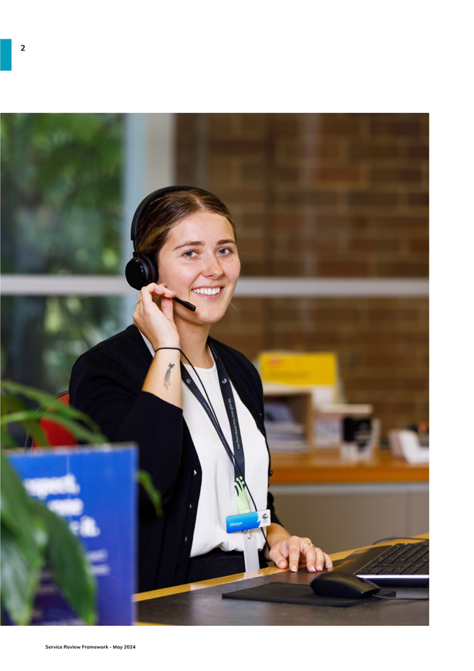 A person wearing a headset and talking on a headset

Description automatically generated